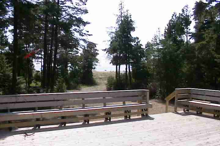 Waterfront seen from cottage deck at BBay's beach house vacation rental cottage on Manitoulin Island, Ontario Canada